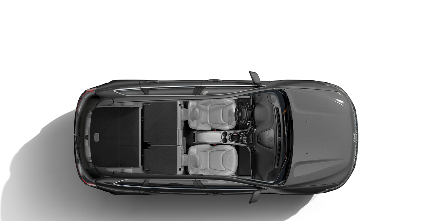 A slider allowing the user to toggle between views of the 2021 Jeep Cherokee with its rear seats folded and raised.
