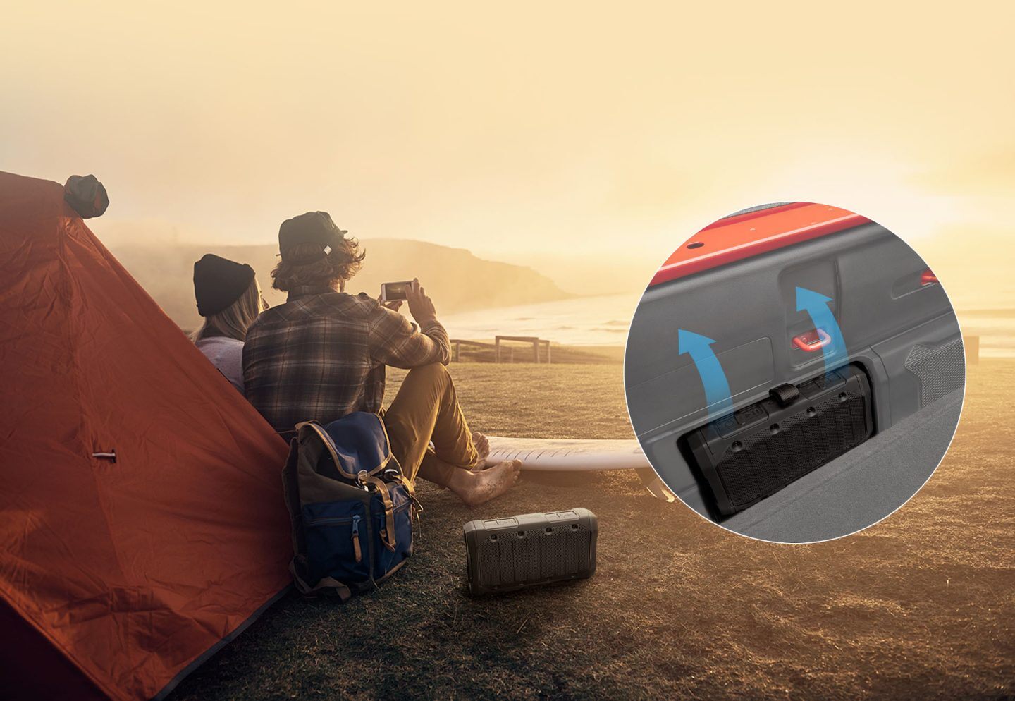 A couple on the beach with a Bluetooth speaker beside them, as well as an inset image showing where the speaker fits into the side of the 2022 Jeep Gladiator truck bed.
